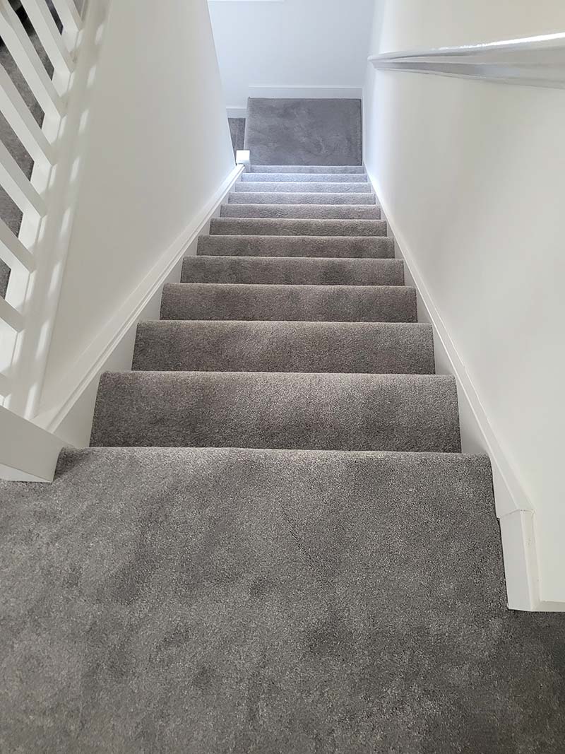 Freshly fitted carpet in a living room